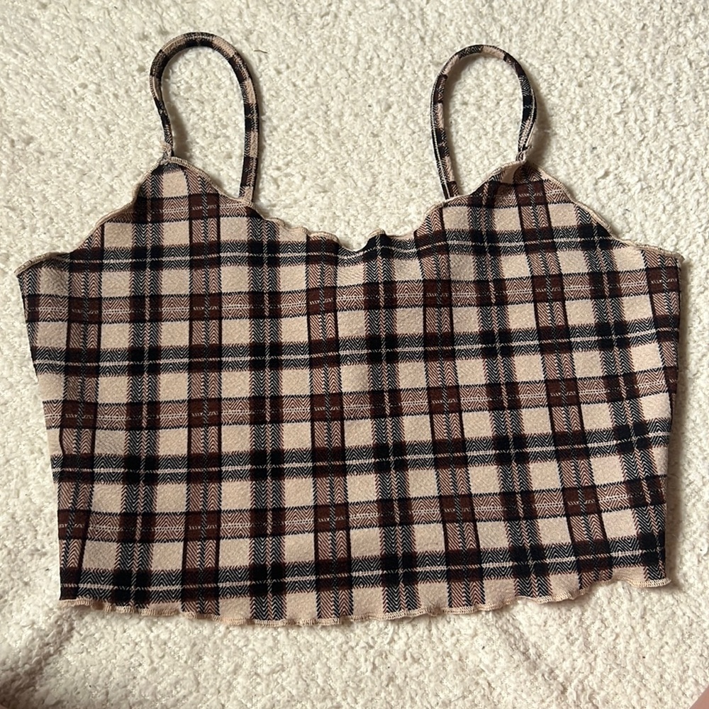 A brown, tan, and black tank top
